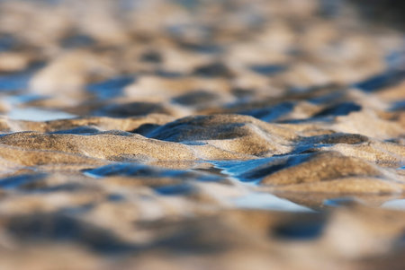closeup of sand pattern of a beach
