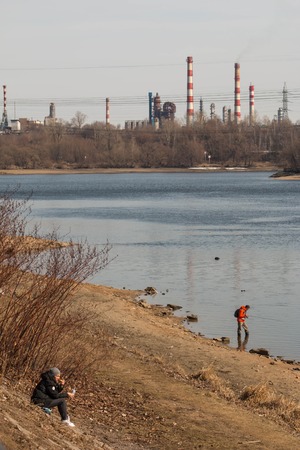 MOSCOW, RUSSIA - March, 2016: Kapotnya, Moskva Reka, Maryno and Brateevo, outskirts of UVAO Moscow, Russia. view of refinery MNPZ, park and Moscow Riverのeditorial素材