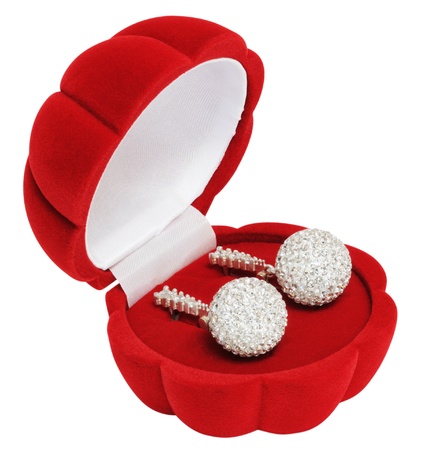 Silver earrings in the form of balls with crystals of optical crystalの写真素材