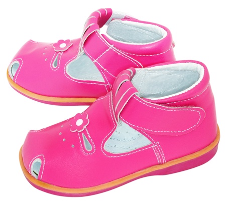 Baby pink sandals on a white backgroundの写真素材