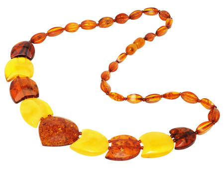 Women from Baltic amber necklace. Isolated on white backgroundの写真素材