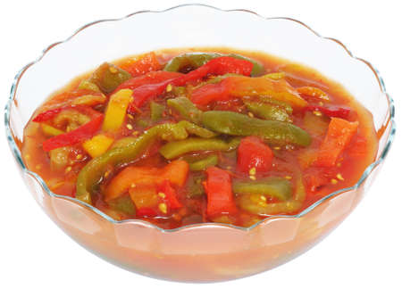 Classic hungarian lecho (lecso) in a clear glass salad bowlの写真素材