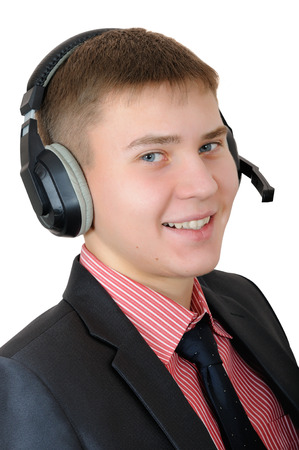 Young man - callas center operator. Portrait on white backgroundの写真素材