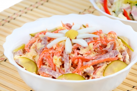 Korean carrot salad with chamomile flower decorated chicken eggsの写真素材