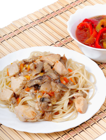 Italian spaghetti with chicken and mushrooms closeupの写真素材
