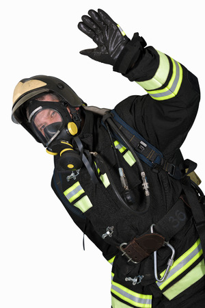 Firefighter in self contained breathing apparatus hand shows gesture OKの写真素材