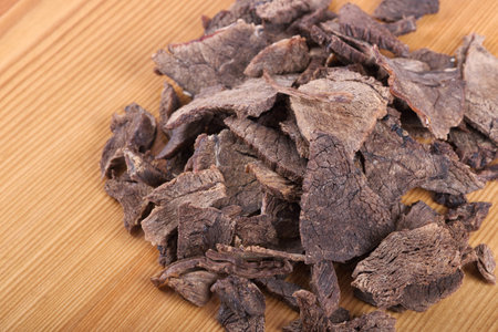 Dried meat cut into thin slices closeupの写真素材