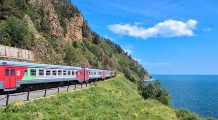 KIRKIREY, IRKUTSK REGION, RUSSIA - July, 29,2016: Baikal Express. Tourist train travel. Organised tour of Circum-Baikal Railway. Route passes through picturesque shore of deep lakeのeditorial素材