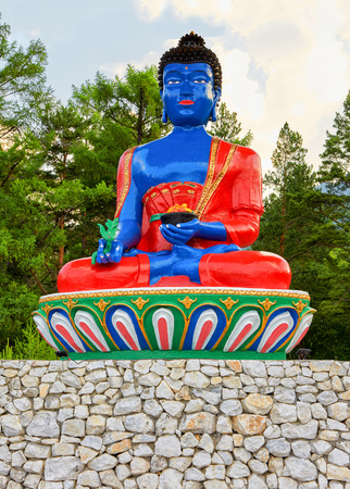 Bhaisajyaguru. Buddha of healing and medicine. Buddhist religious statueのeditorial素材