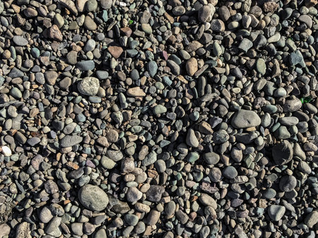 smooth stones on the shore for the background