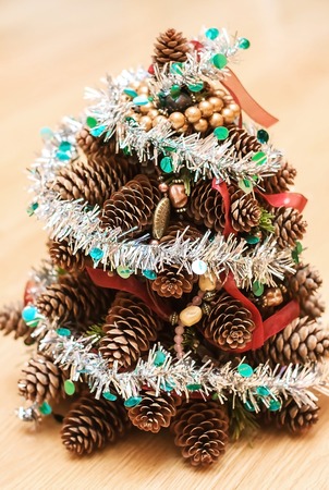 Beautiful artificial Christmas tree from the conesの写真素材