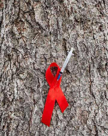 1st December, World Aids Day concept with shiny red ribbon awareness. Health and medicineの写真素材