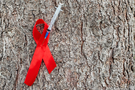 1st December, World Aids Day concept with shiny red ribbon awareness. Health and medicineの写真素材