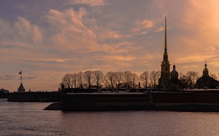 Russia, Saint Petersburg. Peter and Paul fortress and the Neva river at sunset in Saint Petersburg. Urban landscape.の写真素材
