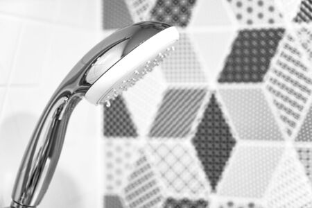 Shower without running water in the new bathroom with European renovation close-up. Soft focus.の写真素材