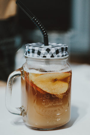 Iced tea with lemon slices and mint