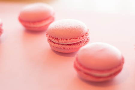 pink macaroons on pink backgroundの写真素材