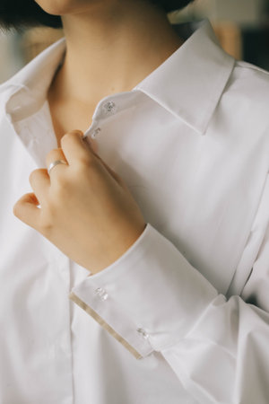 close-up of beautiful cool fashion clothes with hands girlの写真素材