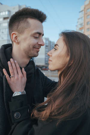 Young loving couple with coffee on ukrainian nature backgroundの写真素材