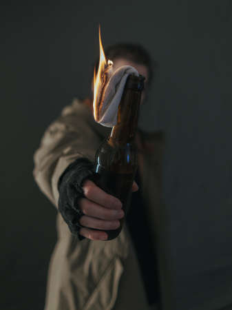 Ukrainian woman with molotov standing for her countryの写真素材