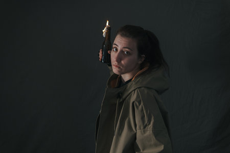 Ukrainian woman with molotov standingの写真素材