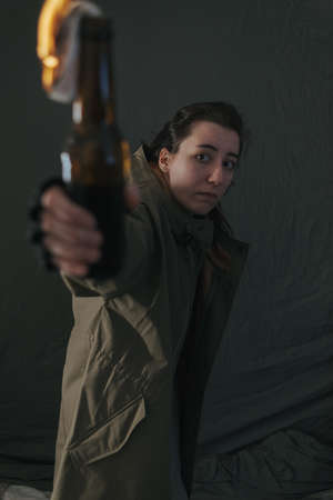 Ukrainian woman with molotov standingの写真素材