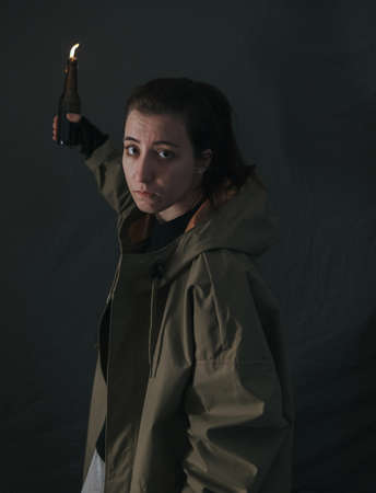 Ukrainian woman with molotov standingの写真素材