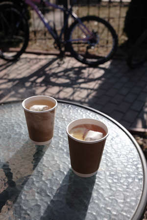 Paper coffee cup in coffee shop.の写真素材
