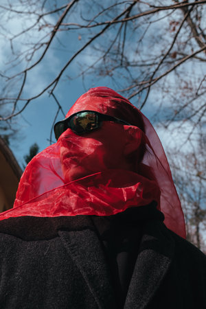 Superhero man with red mask and sunglasses fashion fighter