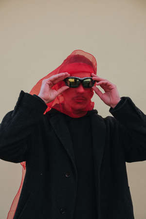 Superhero man with red mask and sunglasses fashion fighterの写真素材