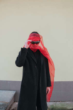 Superhero man with red mask and sunglasses fashion fighterの写真素材
