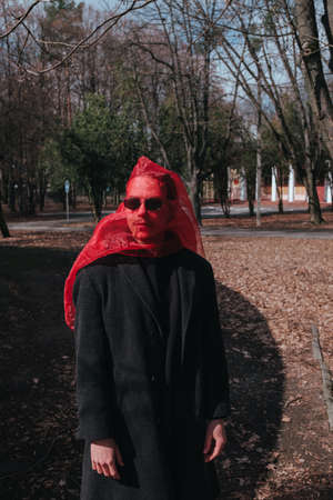 Superhero man with red mask and sunglasses fashion fighterの写真素材
