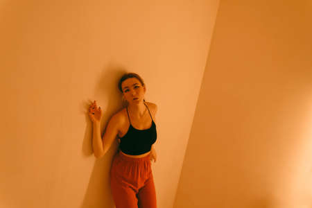 portrait of a young woman with spot lightの写真素材