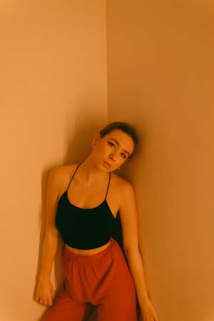 portrait of a young woman with spot lightの写真素材