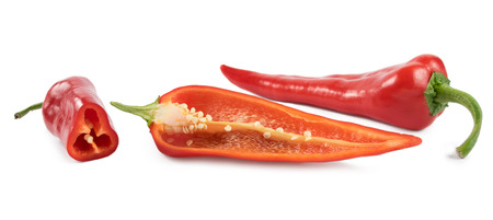 Cut fresh red peppers on a white backgroundの写真素材