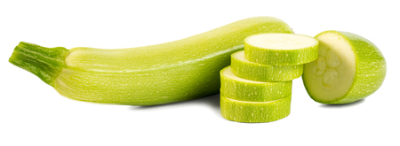 Fresh cut vegetable marrows (zucchinis) isolated on white backgroundの写真素材