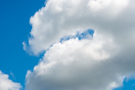 Blue sky with white cloudsの写真素材
