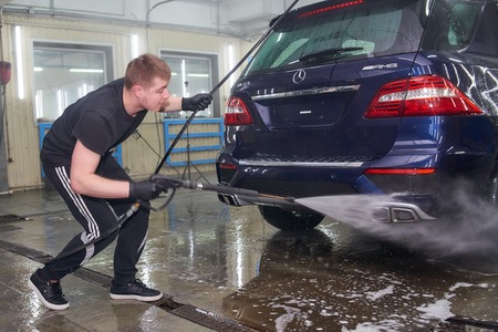 Moscow. Russia. 29th of May, 2018. The man washes the car Mercedes mlのeditorial素材