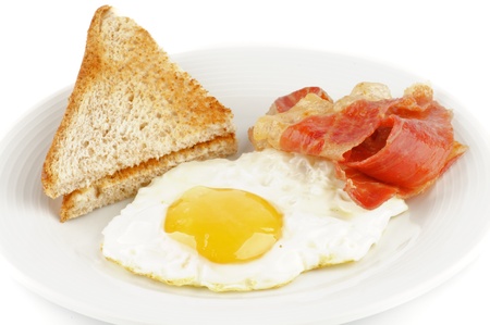Bacon, eggs and toasts isolated on white backgroundの写真素材