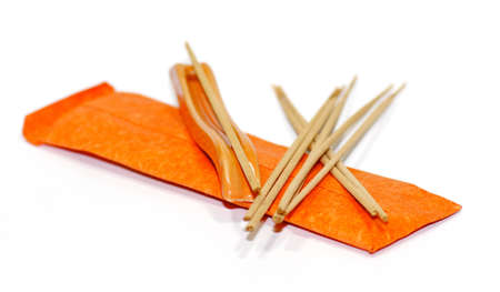 Orange aromatherapy sticks isolated on white backgroundの写真素材
