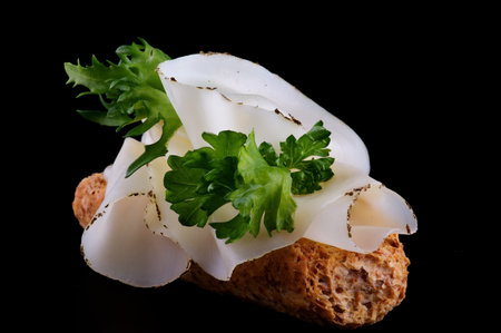 Cheese Sandwich with whole wheat bread and parsley isolated on black backgroundの写真素材