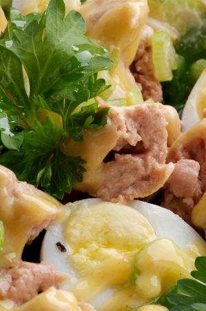 Background of Delicious Salad with Cod Liver, Quail Eggs and Parsley closeupの写真素材