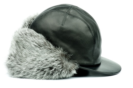 Black Leather Winter Fur Hat with Ear Flaps isolated on white backgroundの写真素材