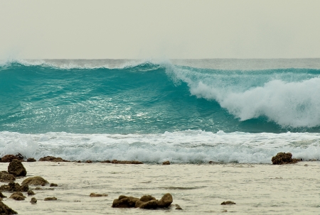 Ocean Wave with Foam Sea Breaking to Beach outdoorsの写真素材