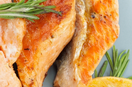 Delicious Grilled Salmon closeup on Green Plateの写真素材