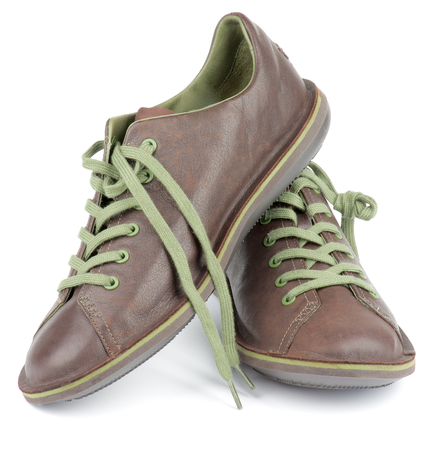 Brown Leather Men Shoes with Green Shoelaces isolated on white backgroundの写真素材