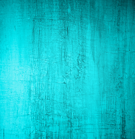 Turquoise Damaged Obsolete Cement Wall Background closeupの写真素材