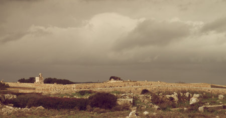 Castle Walls and Watchtower of La Mola Fortaleza Isabel II in Cloudy Day Outdoors, Menorca, Balearic Islands. Retro Styledのeditorial素材