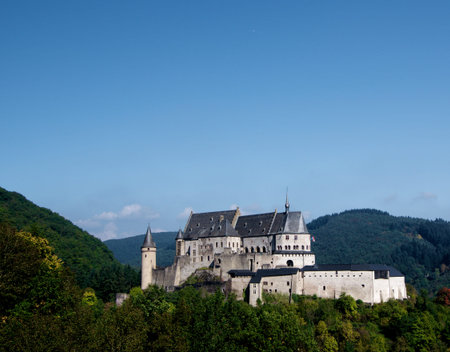 View on Vianden Castle from Hill in Sunny Day on Blue Sky background. Luxembourg, Beneluxのeditorial素材