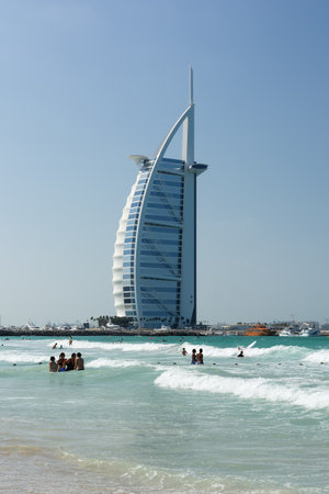 DUBAI, UNITED ARAB EMIRATES - DECEMBER 9, 2016: Cityscape of Burj Al Arab Hotel from Jumeirah beach. It is a luxury hotel located in Dubai, United Arab Emirates, the fourth tallest hotel in the world.のeditorial素材